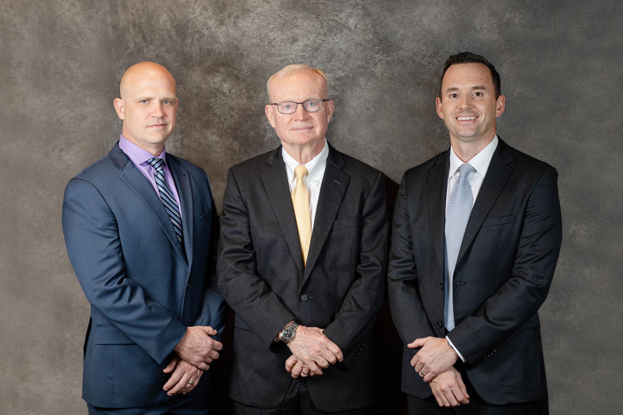A photo of Tom Fleming, Scott Fleming, and Geoffrey Fleming