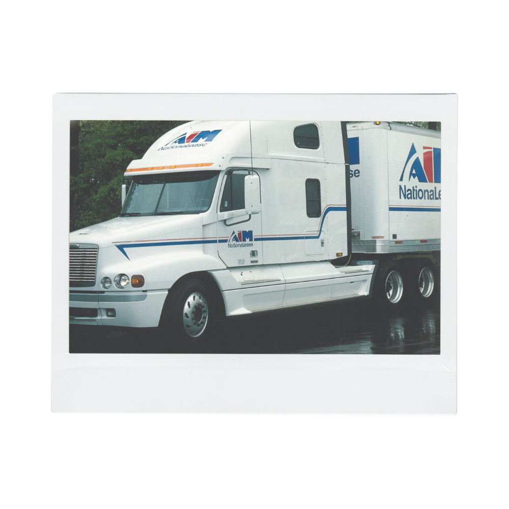 Historic photo of an Aim Transportation Solution truck