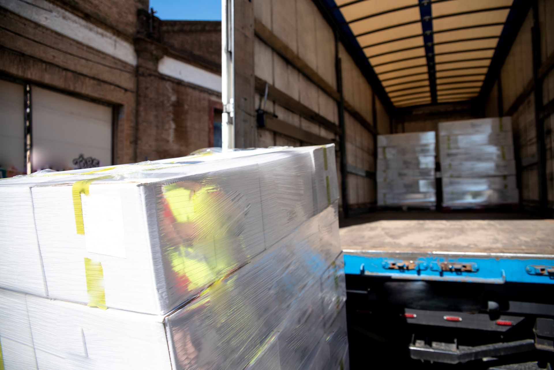 Shipments being loaded onto a truck trailer