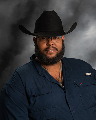 Headshot of Aim service manager Barrett Baskfield.