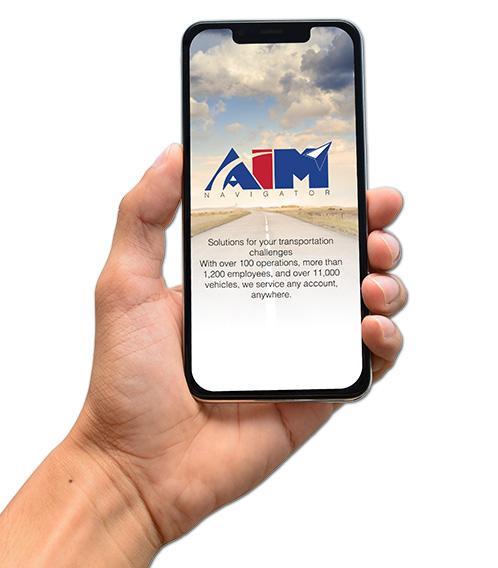 Hand holding smartphone with Aim Navigator app launching.