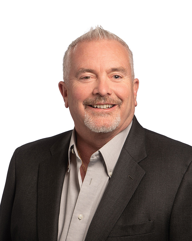 Headshot of Aim CIO & VP of Technology, John Reed